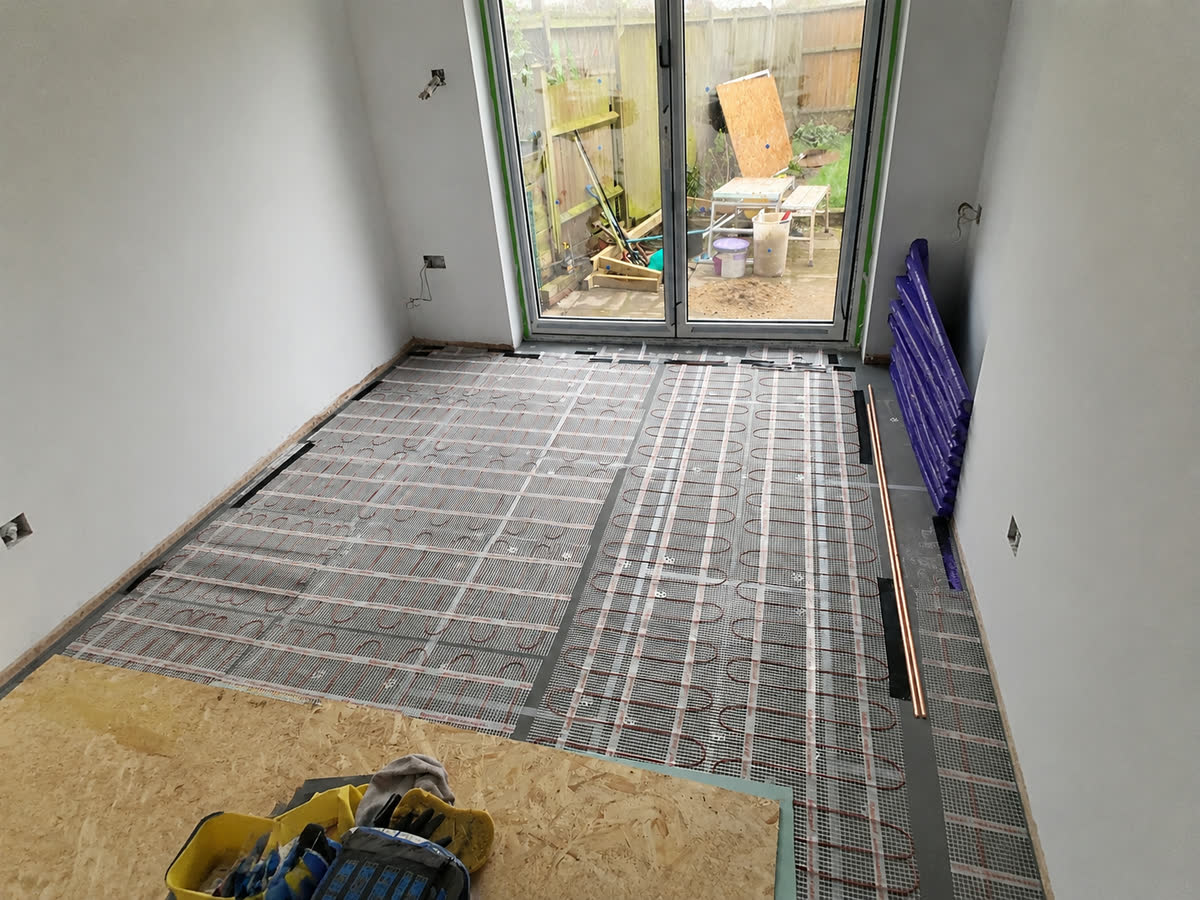 Underfloor heating pipework laid before the floor build-up
