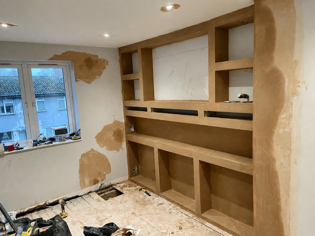 Bespoke built-in joinery fitted into an alcove